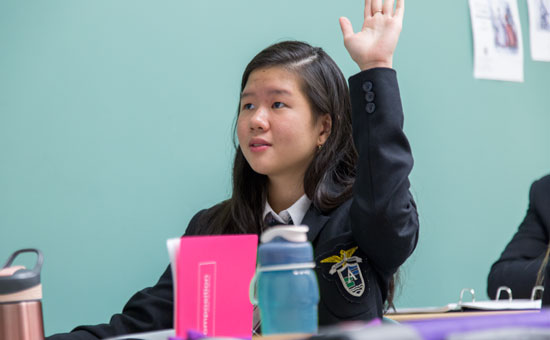 Students chatting with her parents