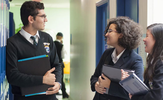 Students chatting with her parents